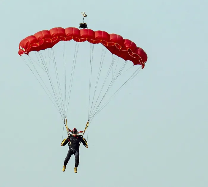 Framed Print : Skydiver in a blue sky