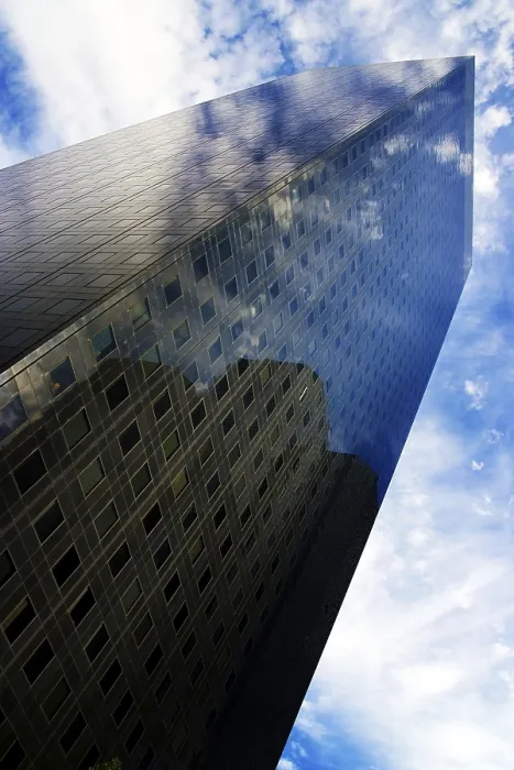 Framed Print : Skyscraper under cloudy blue sky Framed Print : Skyscraper under cloudy blue sky