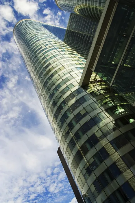Framed Print : Skyscraper und cloudy blue sky