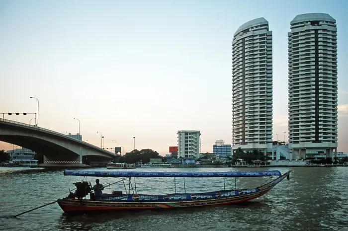 Framed Print : Skyscrapers, longtail boat, Chao Phraya River Framed Print : Skyscrapers, longtail boat, Chao Phraya River