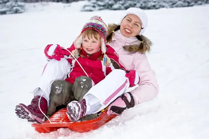 Framed Print : Sledding mother and daughter Framed Print : Sledding mother and daughter