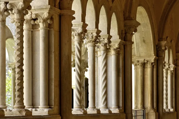 Framed Print : Slender Gothic columns, double columns with filigree capitals in the cloister Framed Print : Slender Gothic columns, double columns with filigree capitals in the cloister