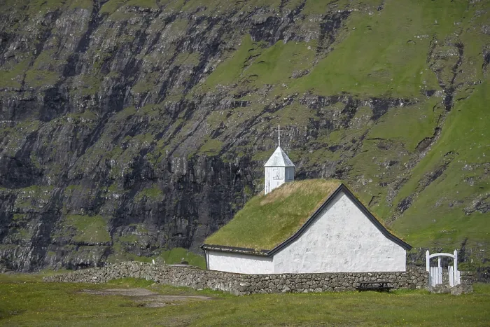 Framed Print : Small church with grass roof in mountain landscape Framed Print : Small church with grass roof in mountain landscape