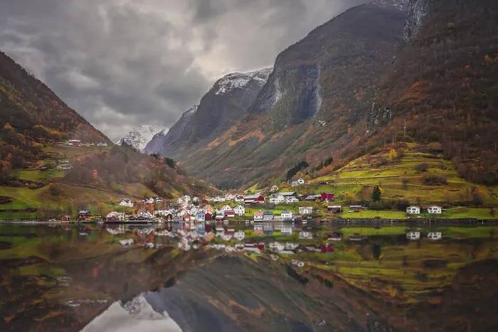 Framed Print : Small homes on the shore of a fjord photographed from a Fjords sightseeing cruise boat leaving Flam in autumn Framed Print : Small homes on the shore of a fjord photographed from a Fjords sightseeing cruise boat leaving Flam in autumn