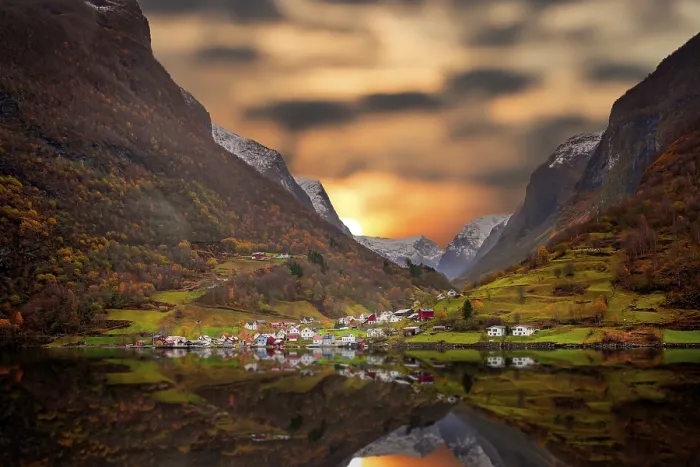 Framed Print : Small homes on the shore of a fjord photographed from a Fjords sightseeing cruise boat leaving Flam in autumn Framed Print : Small homes on the shore of a fjord photographed from a Fjords sightseeing cruise boat leaving Flam in autumn