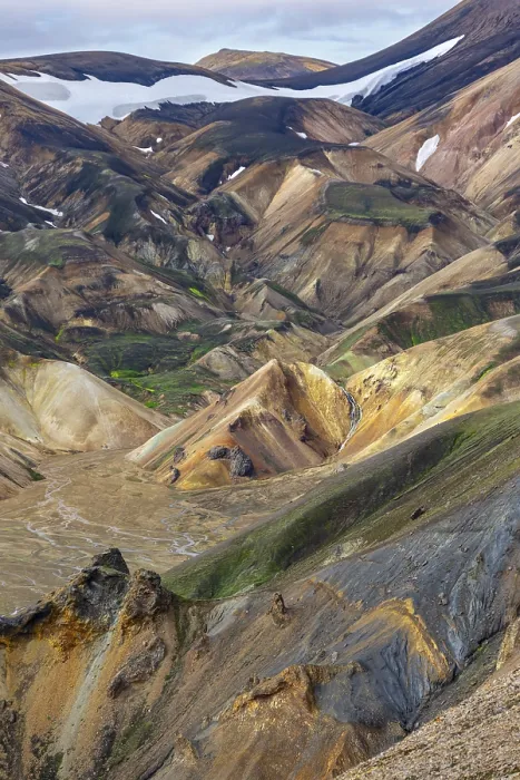 Framed Print : Small river between colourful rhyolite mountains