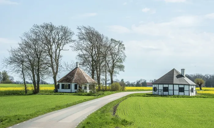 Framed Print : Two small round houses by a road in Ingelstorp in Ystad municipality