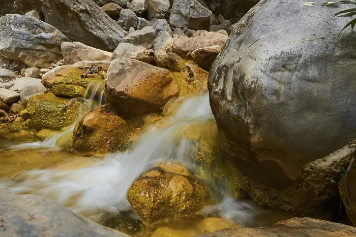 Framed Print : Small waterfall, rocks, long exposure