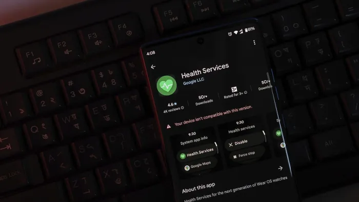 Framed Print : Smartphone displaying Health Services app interface in a dark setting with visible keyboard