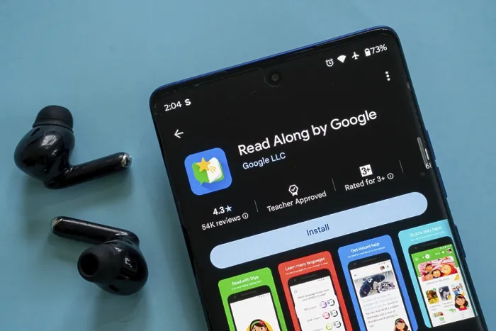 Framed Print : A smartphone displaying the Read Along by Google app ready to install