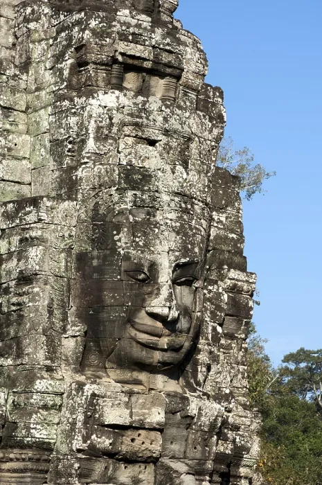 Framed Print : Smile of Angkor, huge face carved in stone on a tower