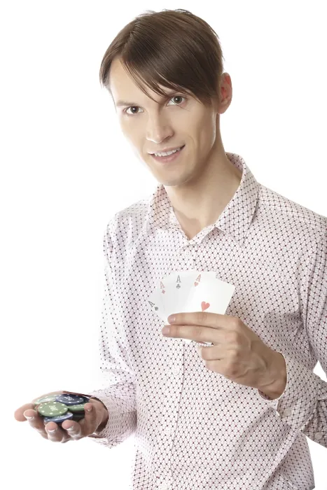 Framed Print : Smiling man holding poker cards and chips on a white background