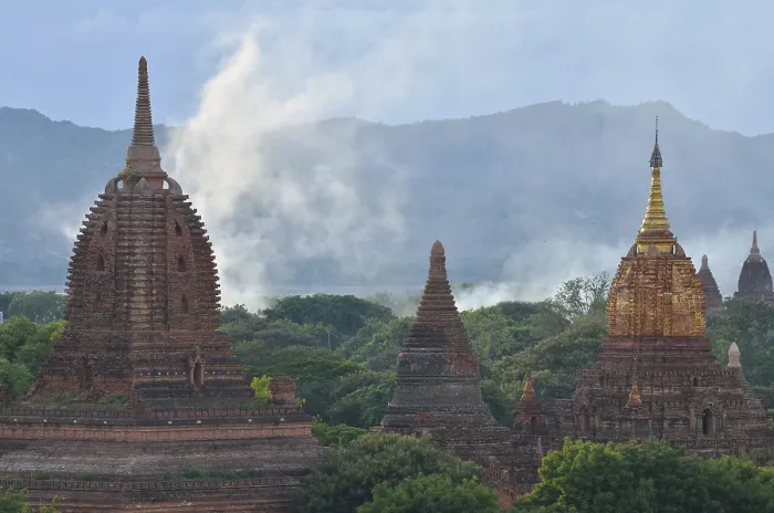 Framed Print : Smoke rising between the temples and pagodas in Bagan