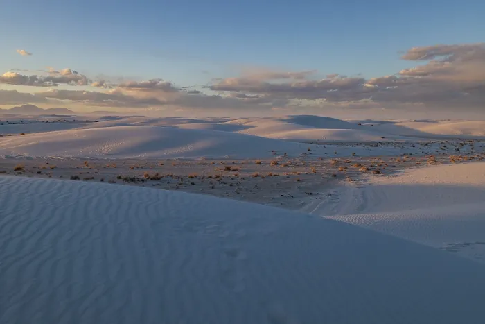 Framed Print : Smooth curved sand dunes in evening light at White Sands National Park in Alamogordo