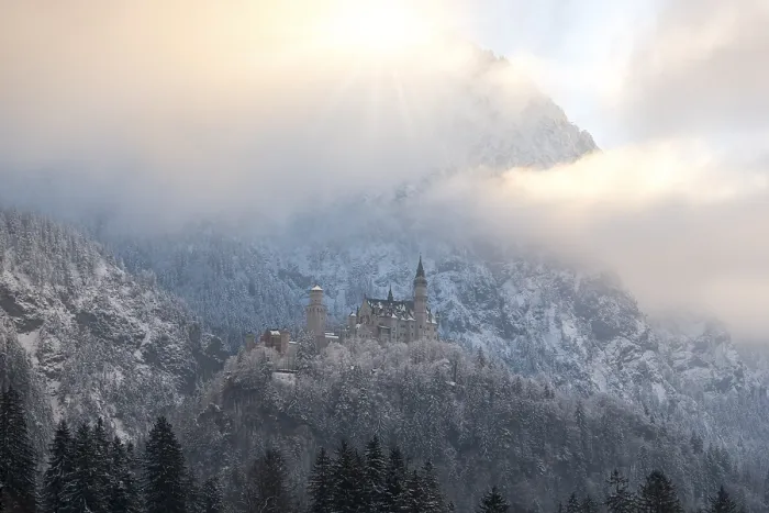 Framed Print : Snow-covered castle at sunrise