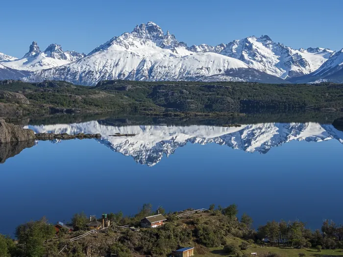 Framed Print : The snow-covered Mt. Cerro Castillo is reflected in a lake Framed Print : The snow-covered Mt. Cerro Castillo is reflected in a lake
