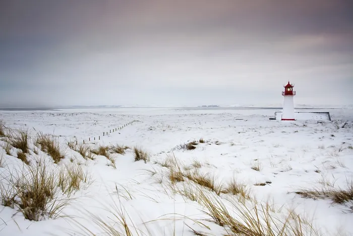 Framed Print : Snow on the island of Sylt at the Ellenbogen at the Lighthouse West Framed Print : Snow on the island of Sylt at the Ellenbogen at the Lighthouse West