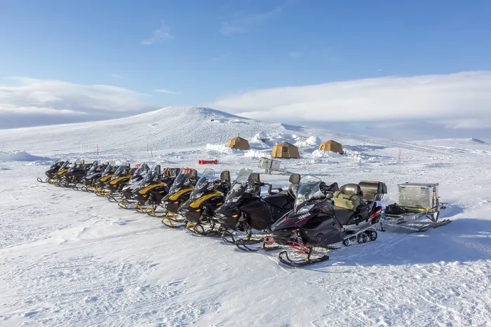 Framed Print : Snowmobiles, snow scooters at Arctic expedition camp with tents protected by tripwire fence against polar bears Framed Print : Snowmobiles, snow scooters at Arctic expedition camp with tents protected by tripwire fence against polar bears