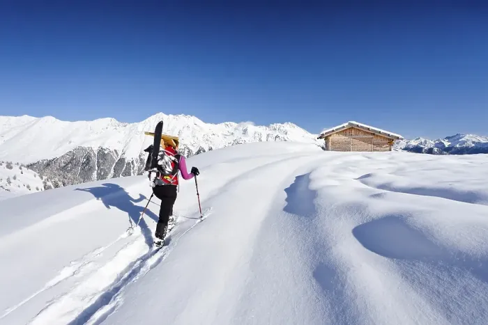 Framed Print : Snowshoer during the ascent to Jagelealm alp in the Ridnauntal valley above Entholz