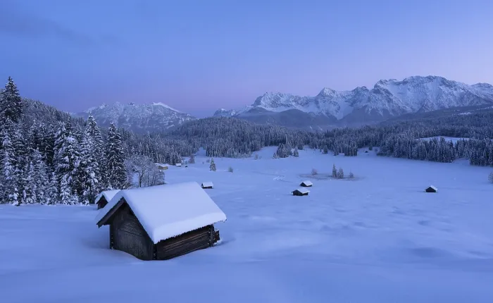 Framed Print : Snowy landscape with huts and forests in front of a mountain panorama in the soft light of the morning at Geroldsee Framed Print : Snowy landscape with huts and forests in front of a mountain panorama in the soft light of the morning at Geroldsee
