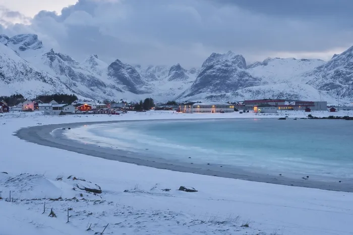 Framed Print : Snowy landscape at sea bay with sandy beach