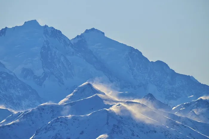 Framed Print : Snowy mountain peaks backlit with snow