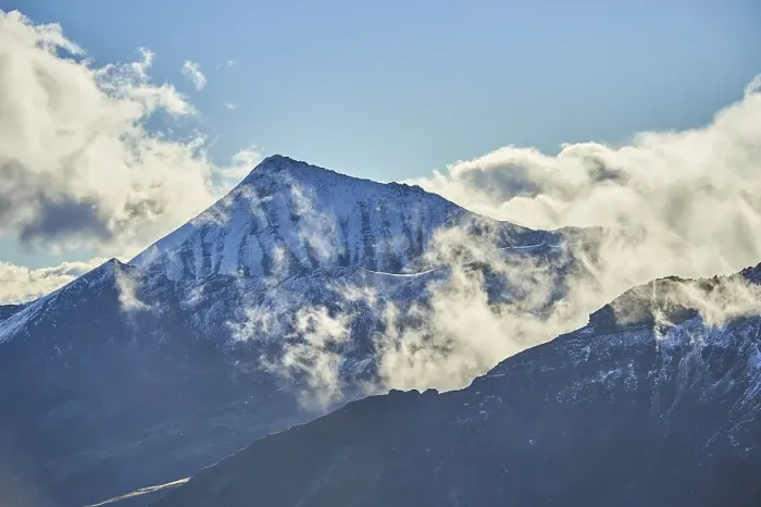 Framed Print : Snowy Mountains above the clouds at Hochalpenstrasse
