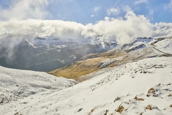 Framed Print : Snowy Mountains with clouds at Hochalpenstrasse