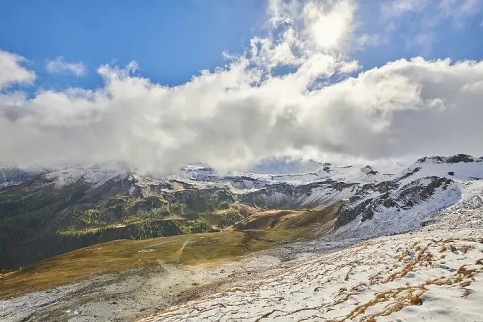 Framed Print : Snowy Mountains with clouds at Hochalpenstrasse