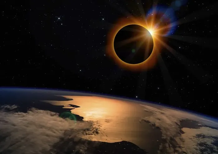 Framed Print : Solar eclipse with orange halo over the planet Earth Framed Print : Solar eclipse with orange halo over the planet Earth
