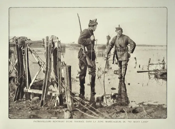 Framed Print : Soldier returning from reconnaissance patrol in flooded terrain in Flanders during the First World War