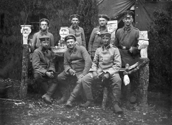 Framed Print : Soldiers with carved wooden heads
