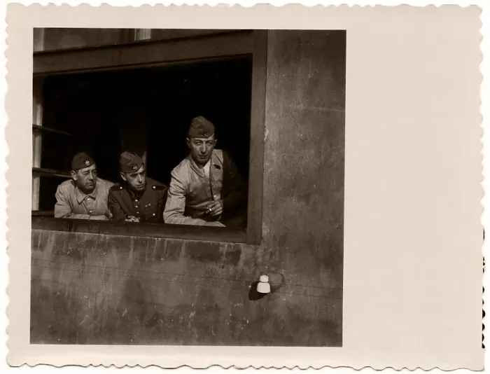 Framed Print : Soldiers looking out of a window