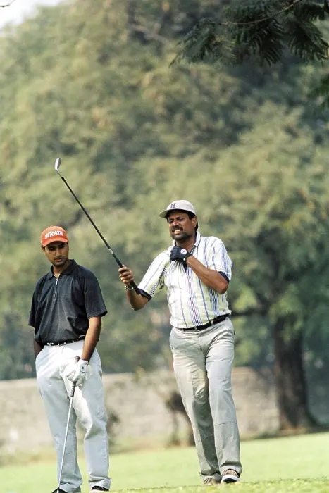 Framed Print : South asian indian cricketer and Former Indian cricket captain Kapil Dev playing golf at Bombay Presidency Golf Club