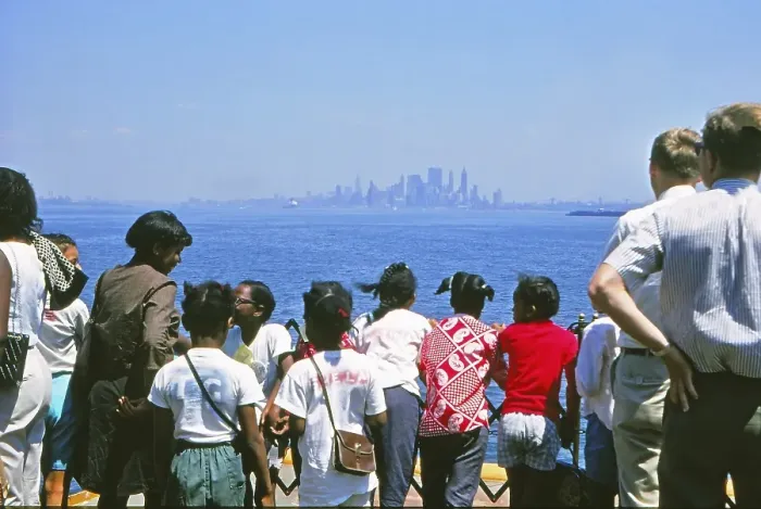 Framed Print : Southern Manhattan, seen from a ferry with black children, New York in 1966