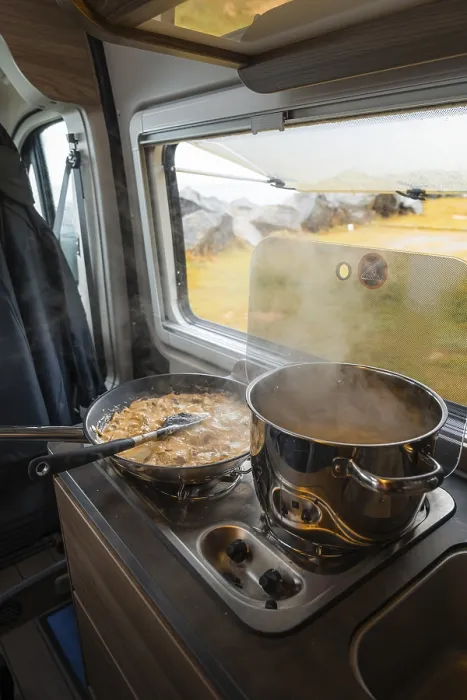 Framed Print : Spaghetti with creamy cream sauce cooked on gas stove in Campervan
