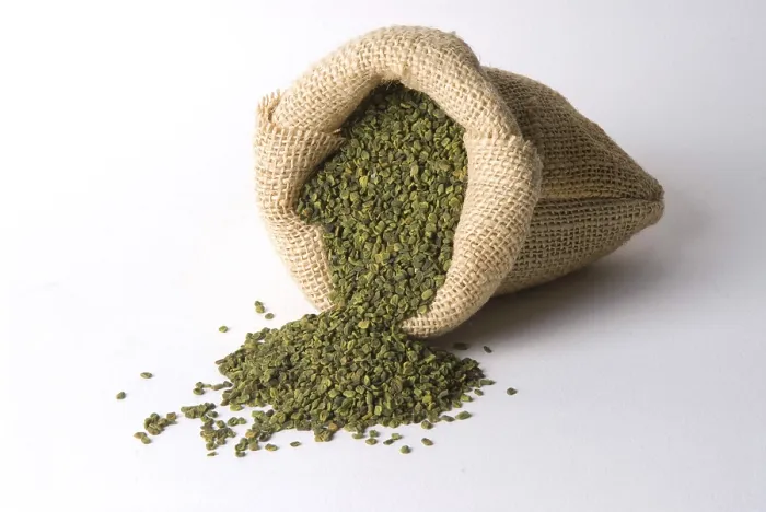 Framed Print : Spices, fenugreek seeds methi trigonella foenumgraecum in jute sack spread on white background