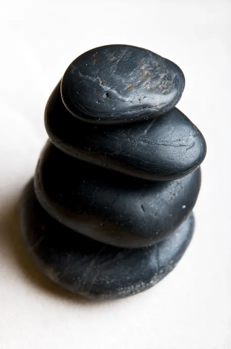 Framed Print : A stack of smooth black stones suggesting balance and tranquility