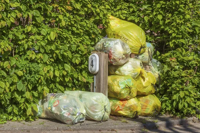Framed Print : Stacked yellow bags for plastic waste, Germany Framed Print : Stacked yellow bags for plastic waste, Germany