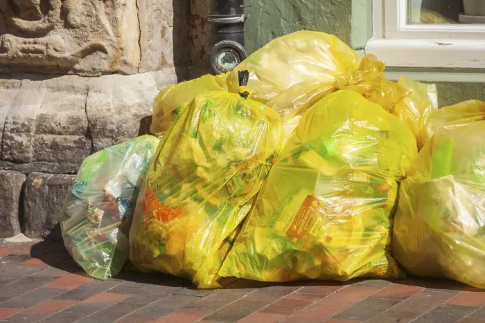 Framed Print : Stacked yellow bags for plastic waste, Germany Framed Print : Stacked yellow bags for plastic waste, Germany