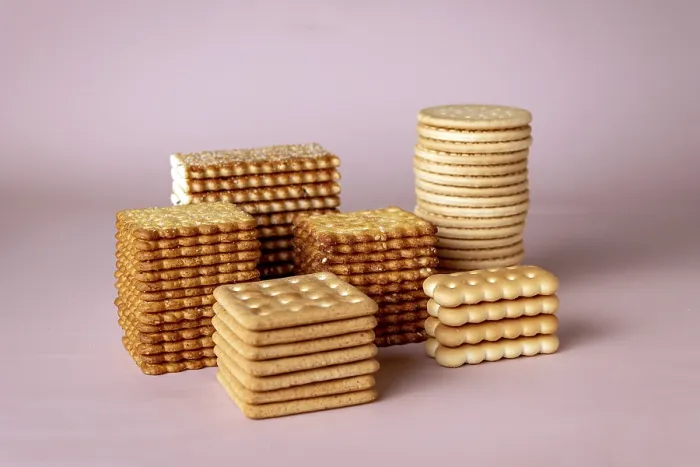 Framed Print : Stacks of cookies on a pink background selective focus Framed Print : Stacks of cookies on a pink background selective focus