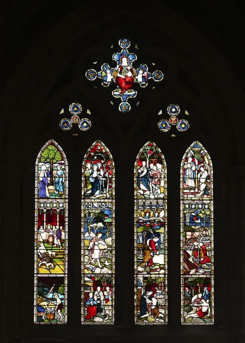Framed Print : Stained glass window with religious depictions and bright colours Framed Print : Stained glass window with religious depictions and bright colours