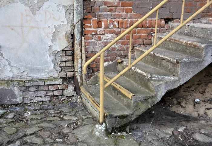 Framed Print : Stairs at an abandoned railway station building