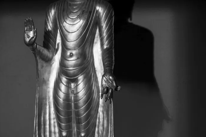Framed Print : Standing gilded Buddha statue, right hand (raised) Framed Print : Standing gilded Buddha statue, right hand (raised)