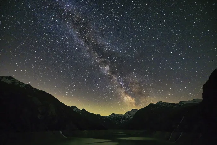 Framed Print : Starry night with the Milky Way over a mountain landscape