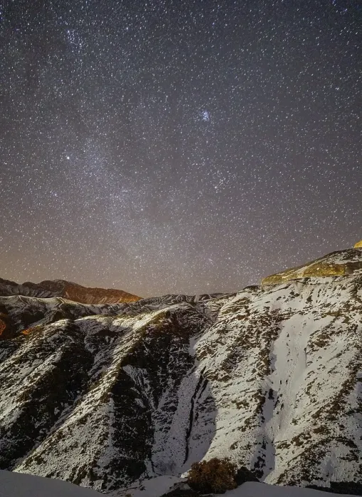 Framed Print : Starry sky over snowy mountains