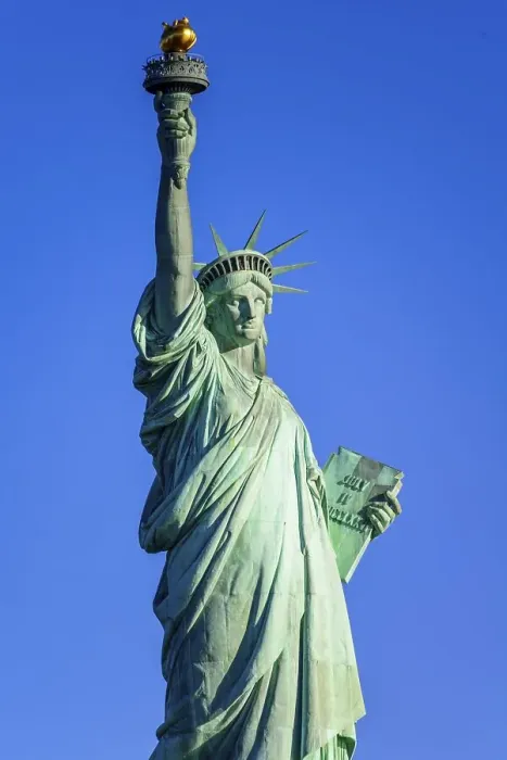 Framed Print : Statue of Liberty in front of blue sky