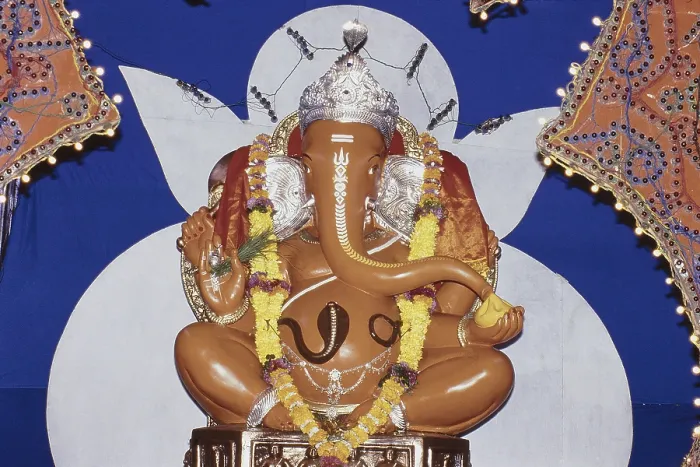 Framed Print : Statue of scarlet colour Lord Ganesha