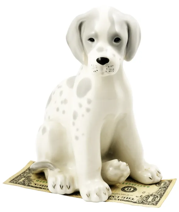 Framed Print : Statuette of dog sitting on bank note Framed Print : Statuette of dog sitting on bank note