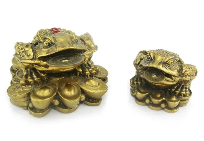 Framed Print : Statuette of two frogs with chinks made of bronze isolated on a white background